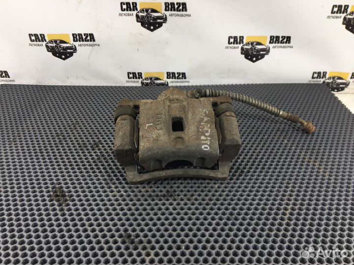 Суппорт задний левый L Kia Sorento