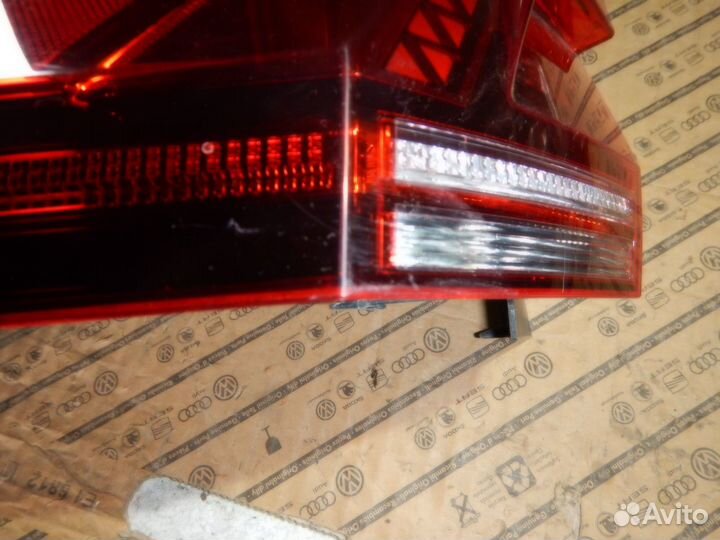 Фонарь левый внешний Volkswagen Tiguan 2