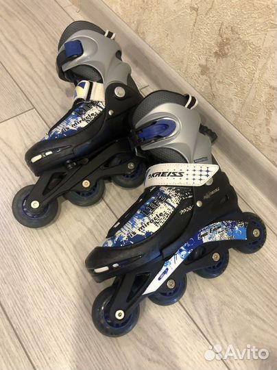 Роликовые коньки