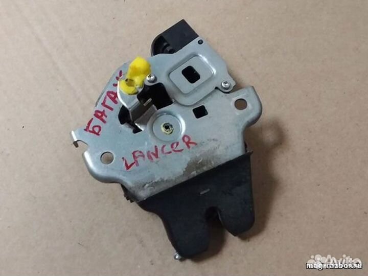 Замок багажника Mitsubishi Lancer X