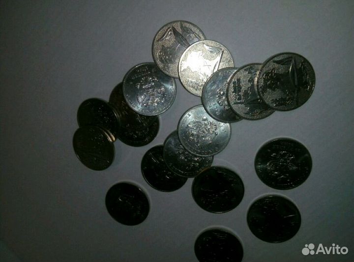 Юбилейные 25р монеты Чемп мира по фут и Сочи2014