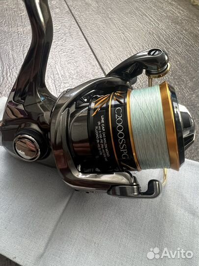 Катушка shimano coare C14+ c2000sspg