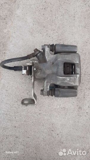 Суппорт задний левый мазда 6 gj