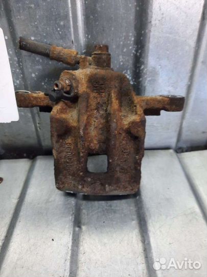 Суппорт тормозной задний правый Hyundai Tucson 1