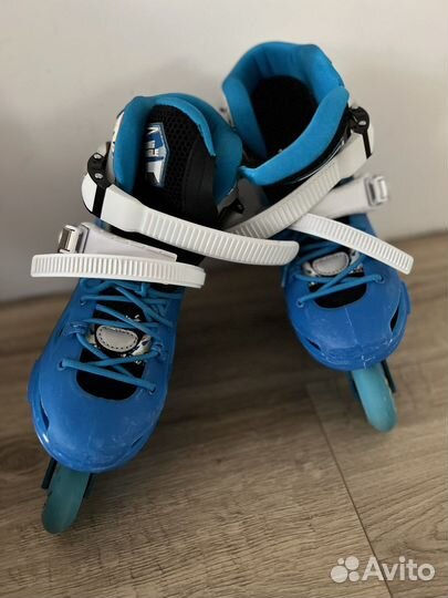 Роликовые коньки