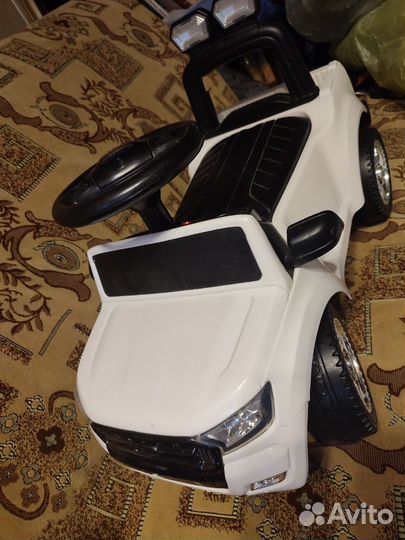 Машинка каталка толокар