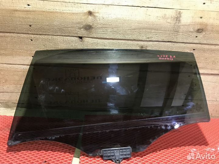 Стекло двери задней левой Kia Quoris