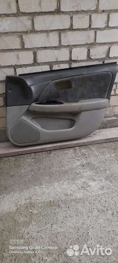 Обшивка двери камри грация