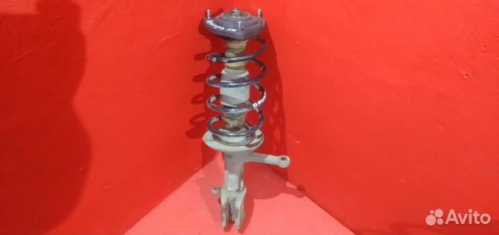 Приора стойка передняя левая амортизатор