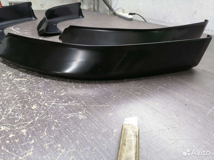 Клыки переднего бампера Лансер 10 рестайлинг