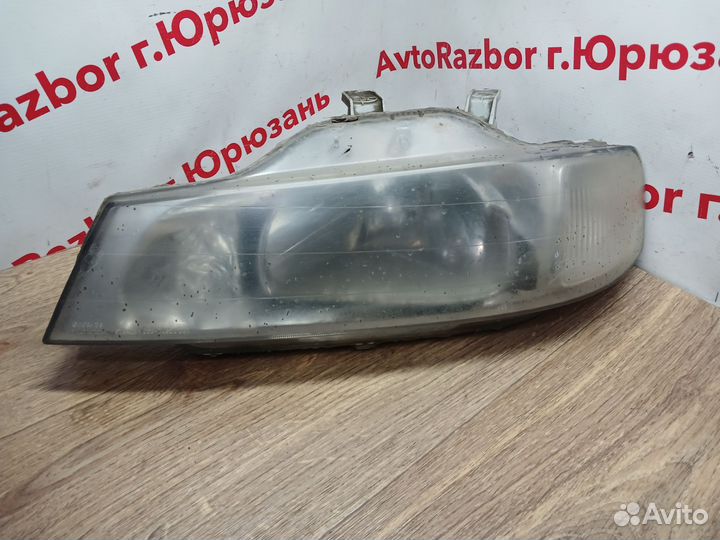 Фара левая Honda Domani MB