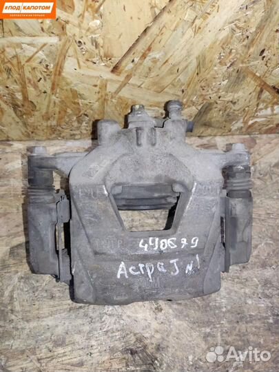 Суппорт тормозной передний левый Opel Astra J