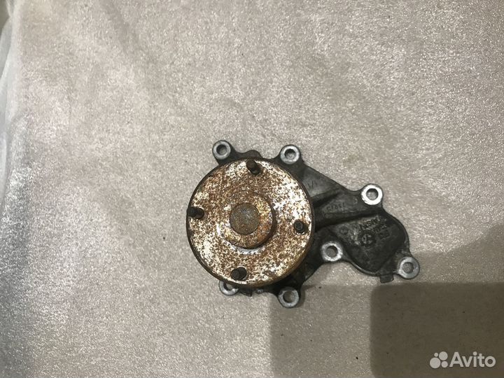 Ниссан Навара D40 водяной насос помпа