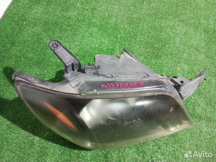 Фара галогеновая правая Mitsubishi Pajero Io H77W