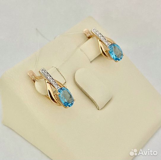 Золотые серьги с топазами