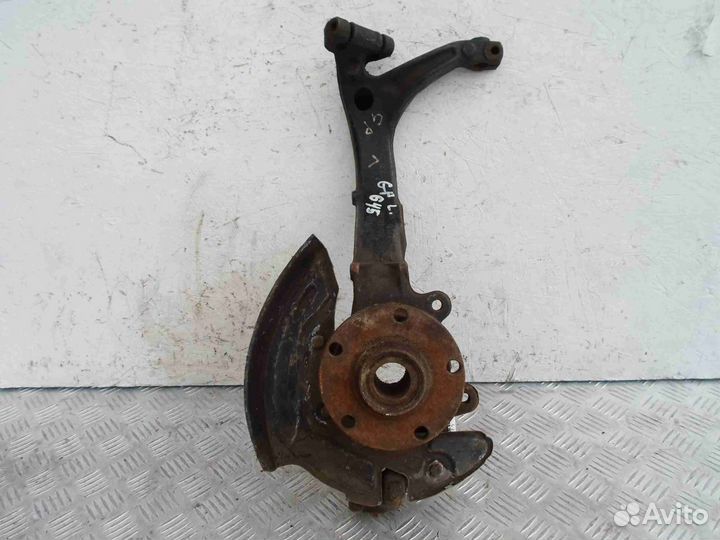 Кулак поворотный левый Volkswagen Passat B5 GP