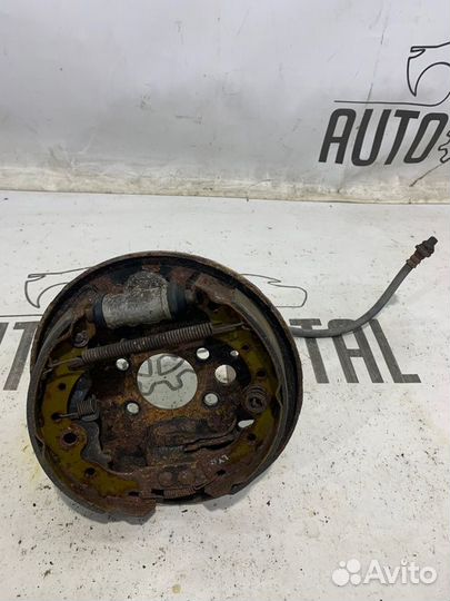 Тормозной механизм правый Nissan Almera Classic