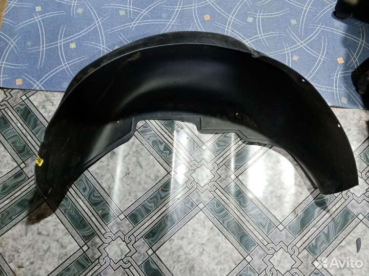 Подкрылок задний левый Emgrand EC7