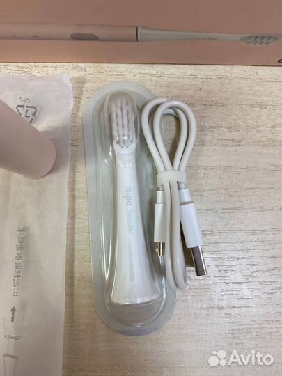 Электрическая зубная щетка