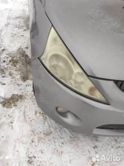 Бампер с птф передний Mitsubishi Grandis