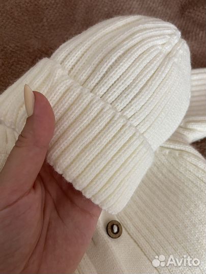 Вязаный комбинезон для новорожденного