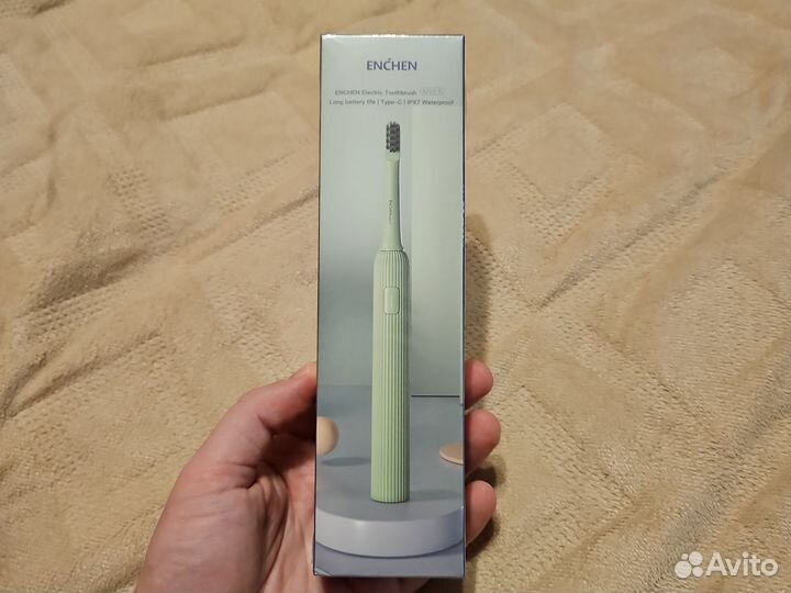 Электрическая зубная щетка