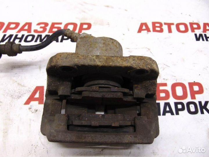 Суппорт тормозной передний левый Renault Megane 1