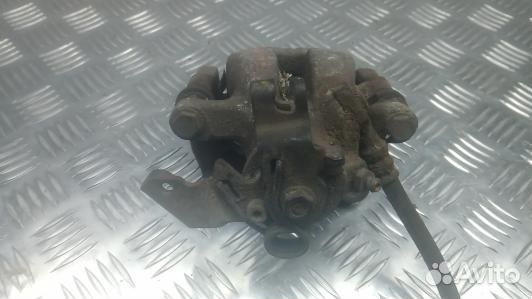 Суппорт тормозной задний левый opel astra H (1OK23LS02)