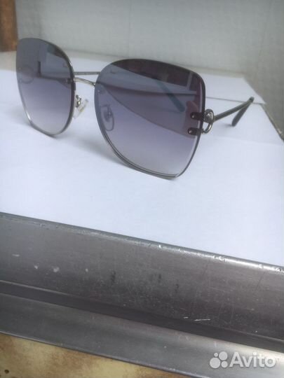 Солнцезащитные очки женские брендовые