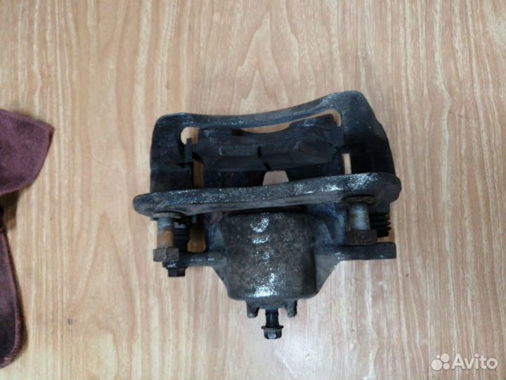 Суппорт тормозной передний Kia Rio 3, Solaris