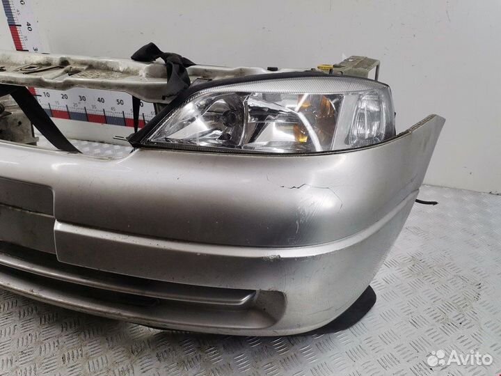 Бампер (ноускат) для Opel Astra G R0B1F11K0V0