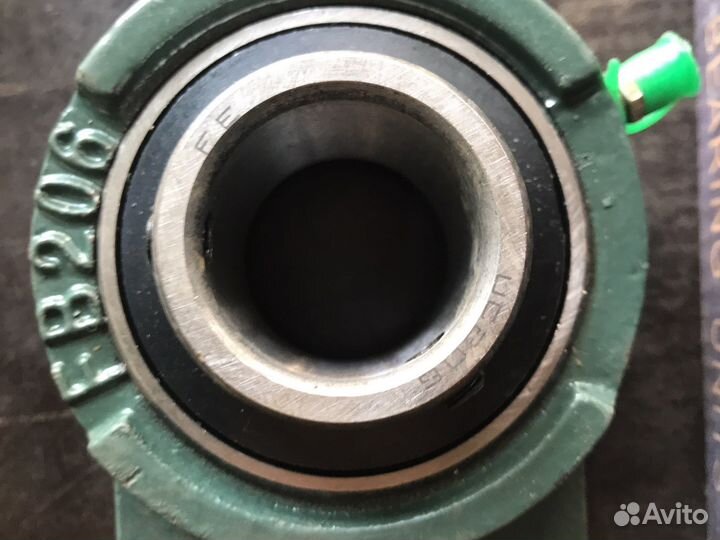 Подшипник В корпусе С ухом крепления FB206