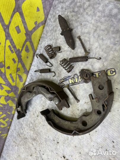 Механизм стояночного тормоза задний левый Lacetti