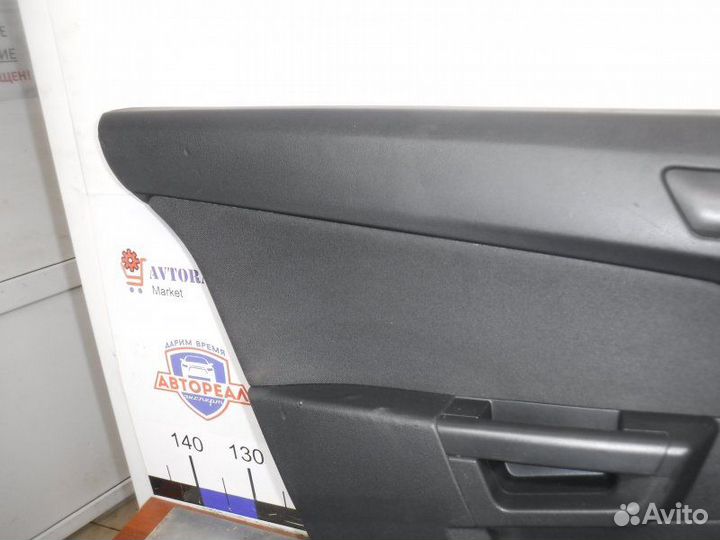 Обшивка двери задняя левая Opel Astra H Z18XER