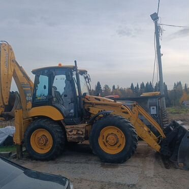 Экскаватор-погрузчик Komatsu WB93S-5E0, 2011