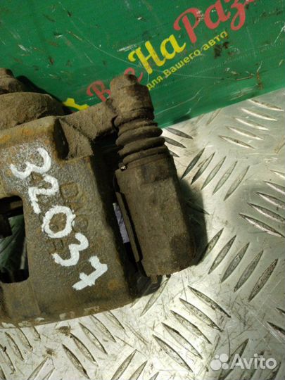 Суппорт передний правый Chevrolet Lanos седан 1.5