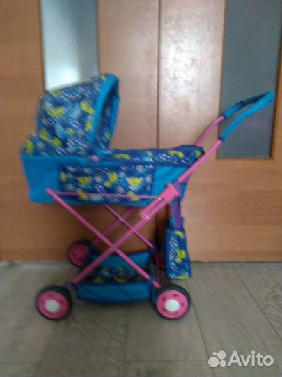Игрушечная коляска для кукол