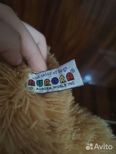 Плюшевый медведь с бантиком