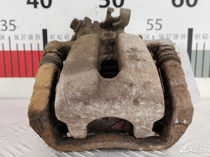 Суппорт задний левый для Opel Meriva A 93179156