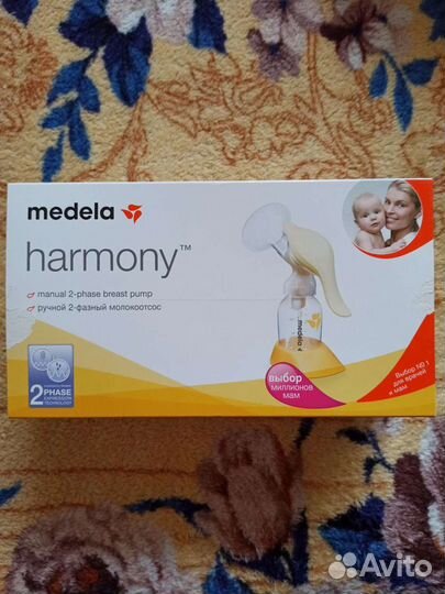 Молокоотсос Medela ручной