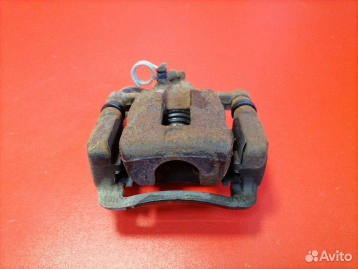 Суппорт задний левый Hyundai Solaris RB G4FA 2011