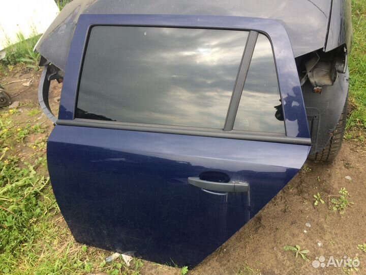 Дверь задняя левая Astra H универсал