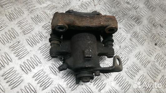 Суппорт тормозной задний левый skoda rapid (NKR02L