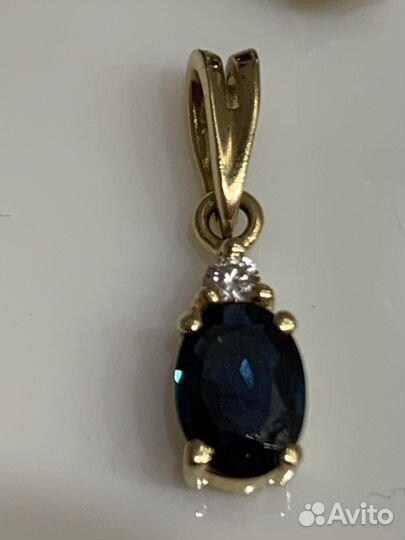 Золотой комплект с сапфирами и бриллиантами