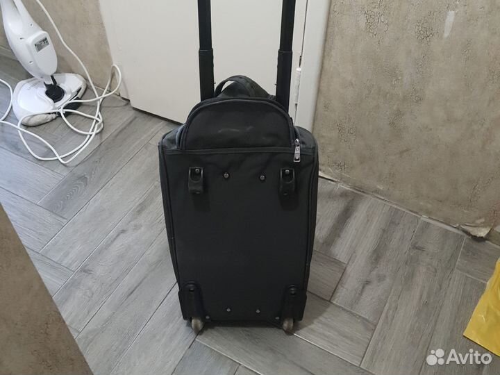 Сумка дорожная на колесах с выдвижной ручкой