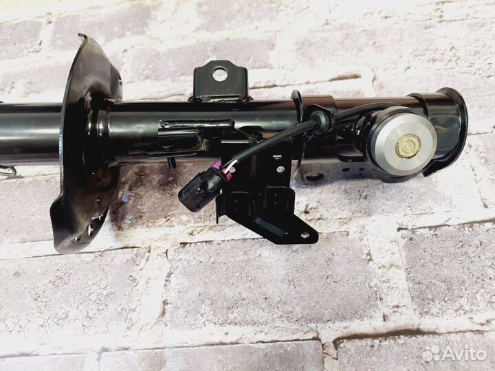 SRX Cadillac амортизатор передний