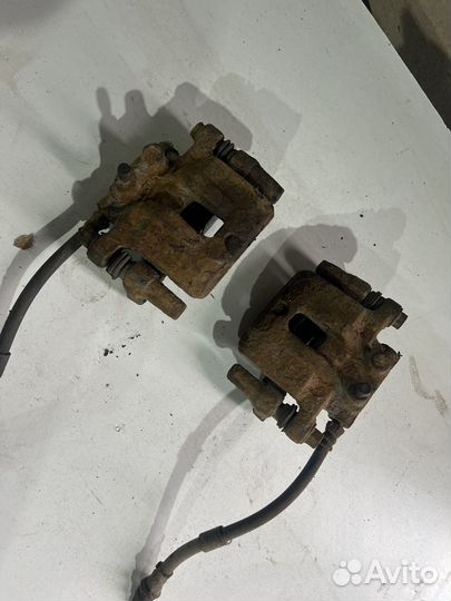 Mitsubishi lancer 10 суппорт задний