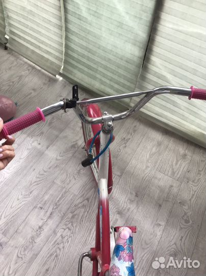 Велосипед для девочки четырех колесный