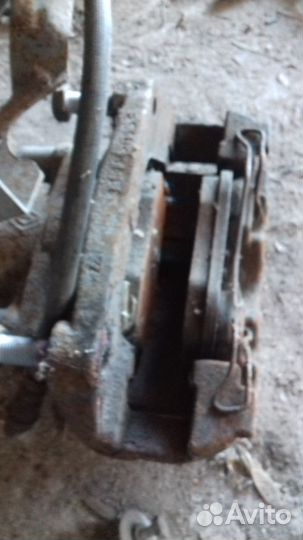 Суппорт тормозной передний левый Renault Fluence