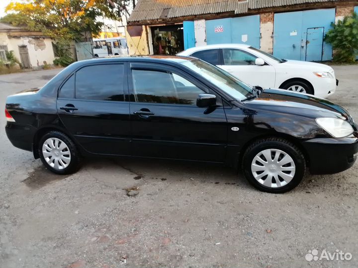 Mitsubishi Lancer 1.3 МТ, 2005, 185 000 км